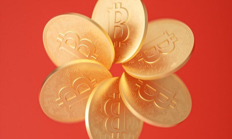 a flower made of gold coins on a red background
