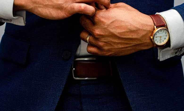 man in blue suit jacket and white dress shirt