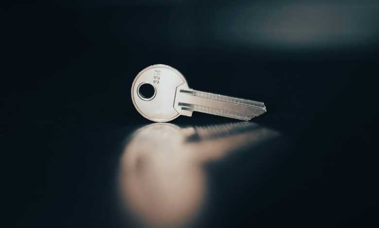 a close up of a key on a table