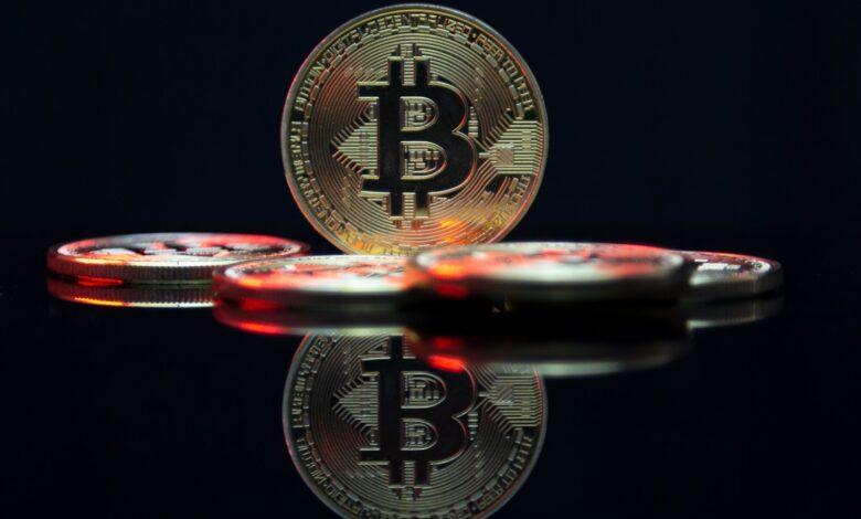 a bit coin sitting on top of a table