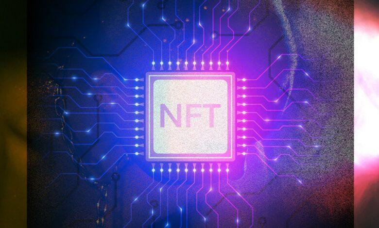 a close up of a circuit board with a neon light